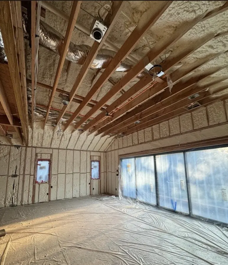 Interior walls and ceiling insulated with spray foam during new construction in Hawthorne